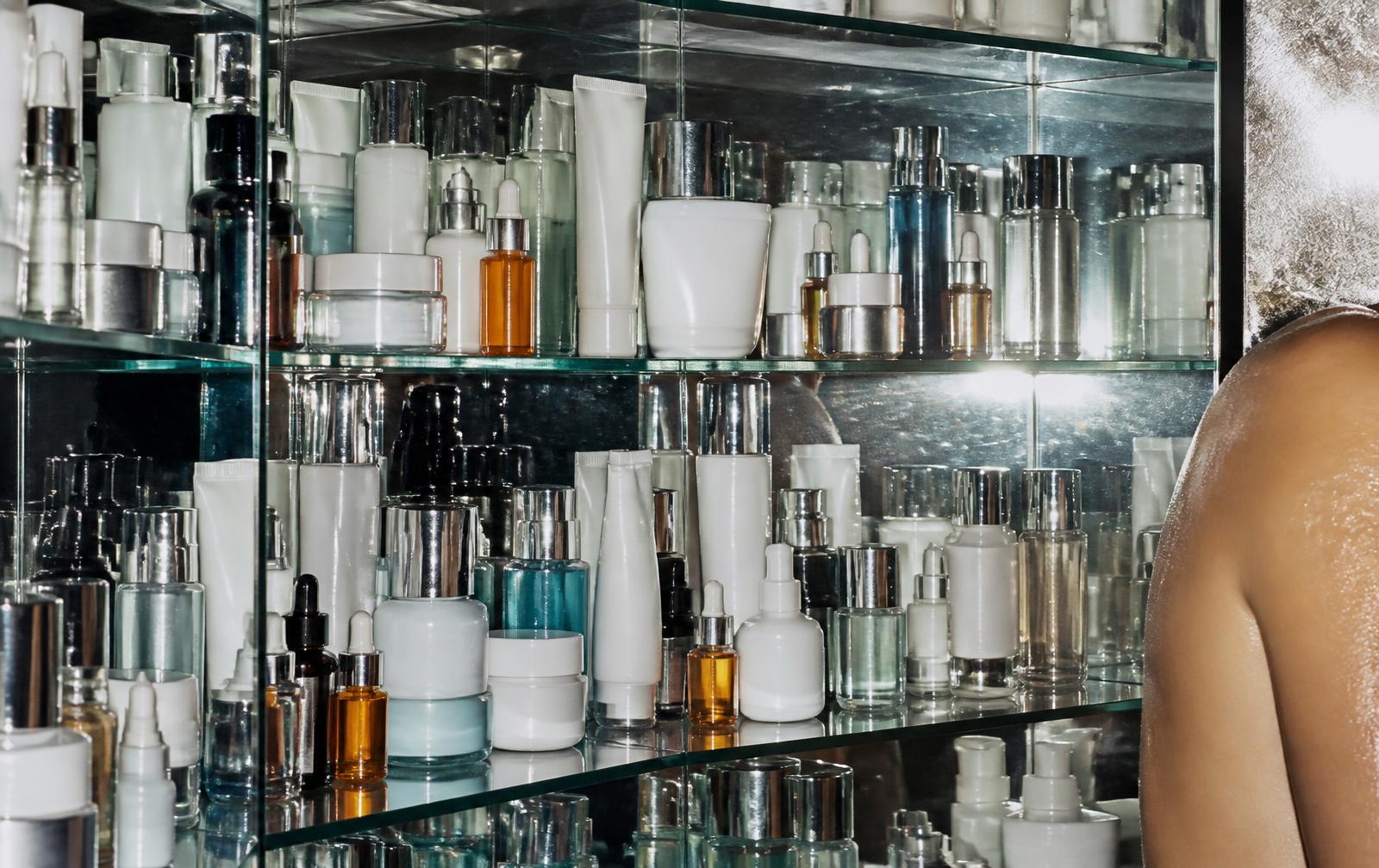 A shelf of unlabelled wellness bottles in flat light